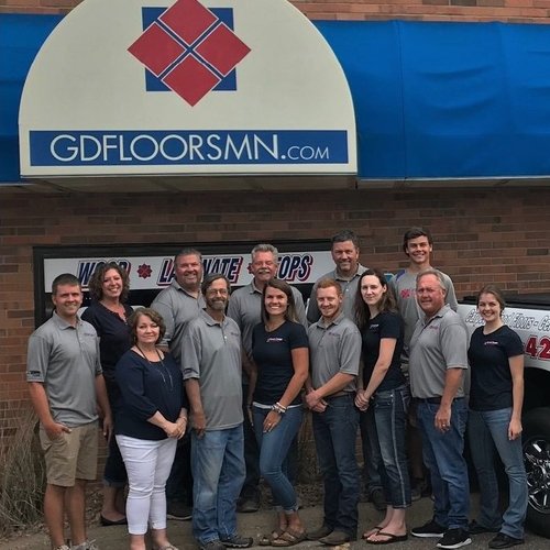 The Grand Design Flooring Team Outside Of Their Store