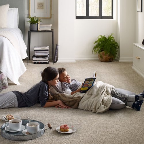 People Laying Down On A Carpet Floor from Grand Design Floors in Maple Grove, MN