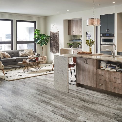 Laminate Plank Flooring In A Kitchen provided by Grand Design Floors in Maple Grove, MN