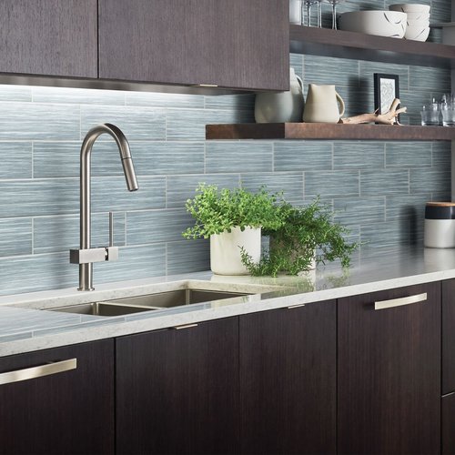 Tile Backsplash And Dark Wood Cabinetry provided by Grand Design Floors in Maple Grove, MN